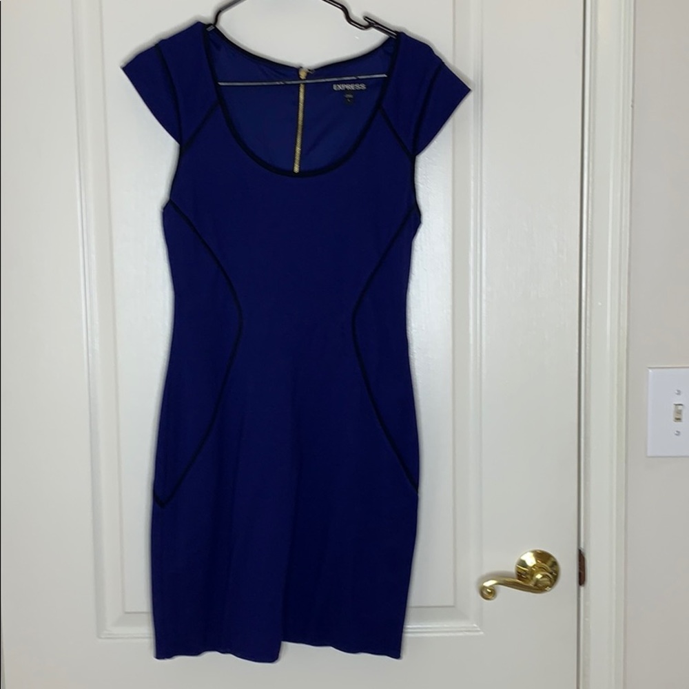 Blue dress with gold zipper. Never worn